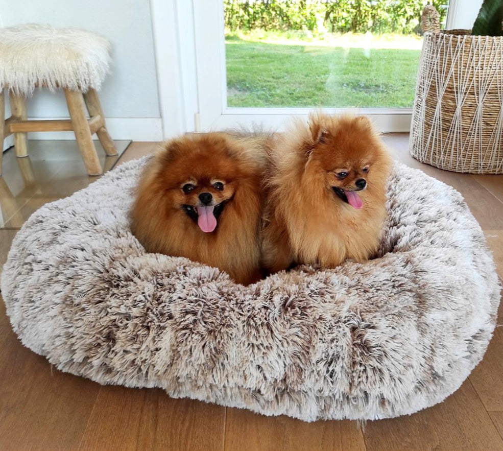 Oval faux fur cushion