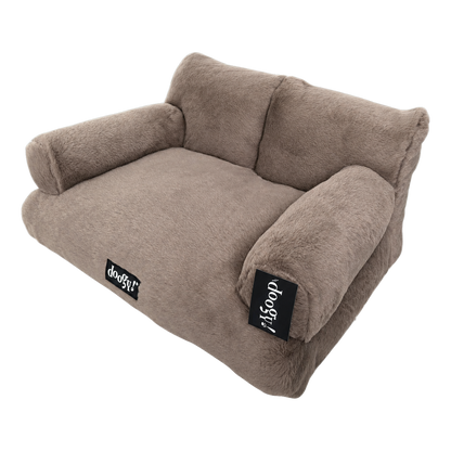 Soft armchair with backrest and armrests